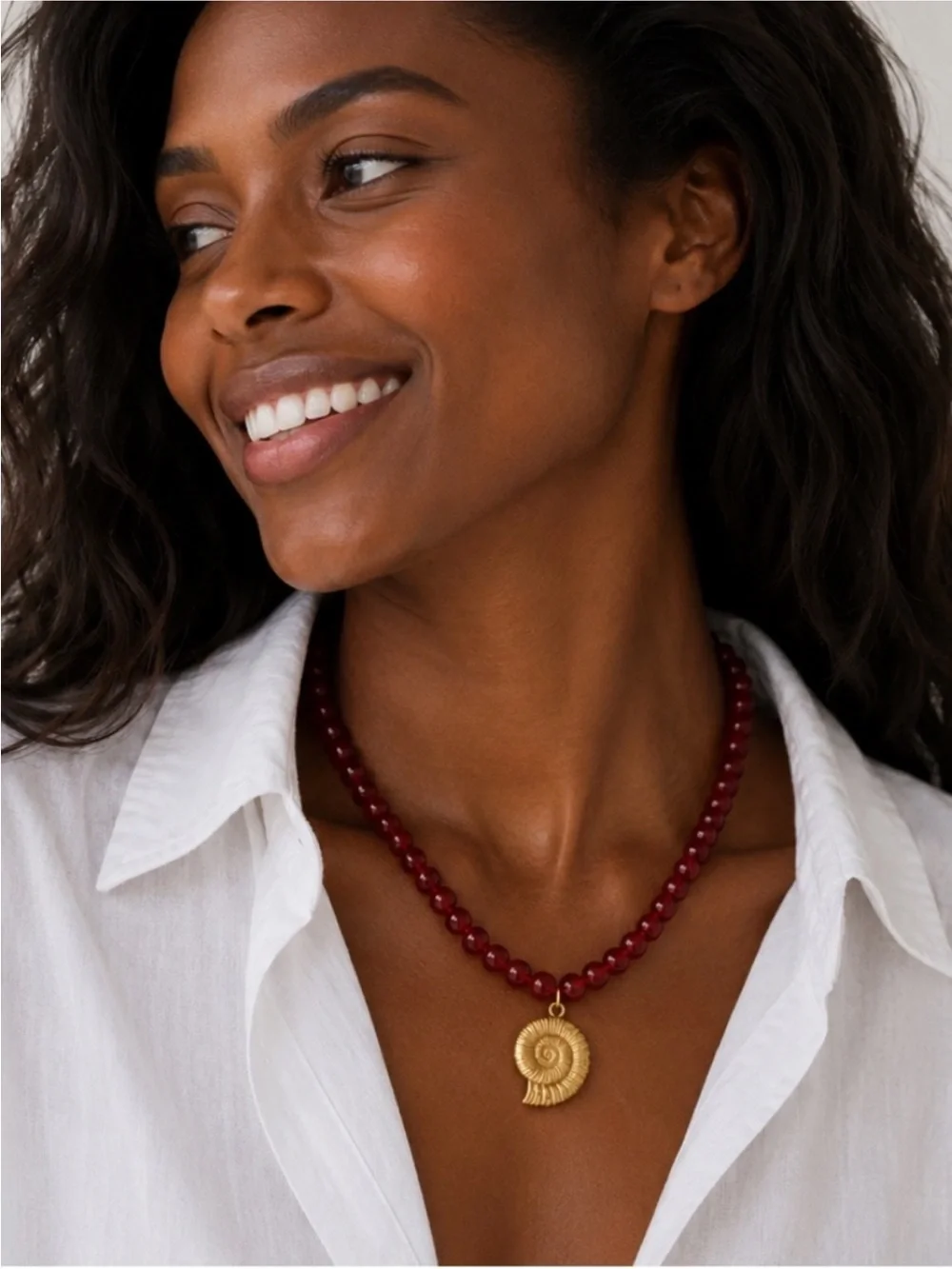 Red Beaded Necklace with Gold Spiral Pendant